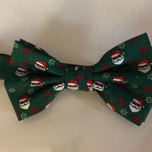 Green bow tie with red, whit Santa’s